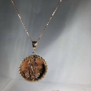 Gold Medallion . Two face saints